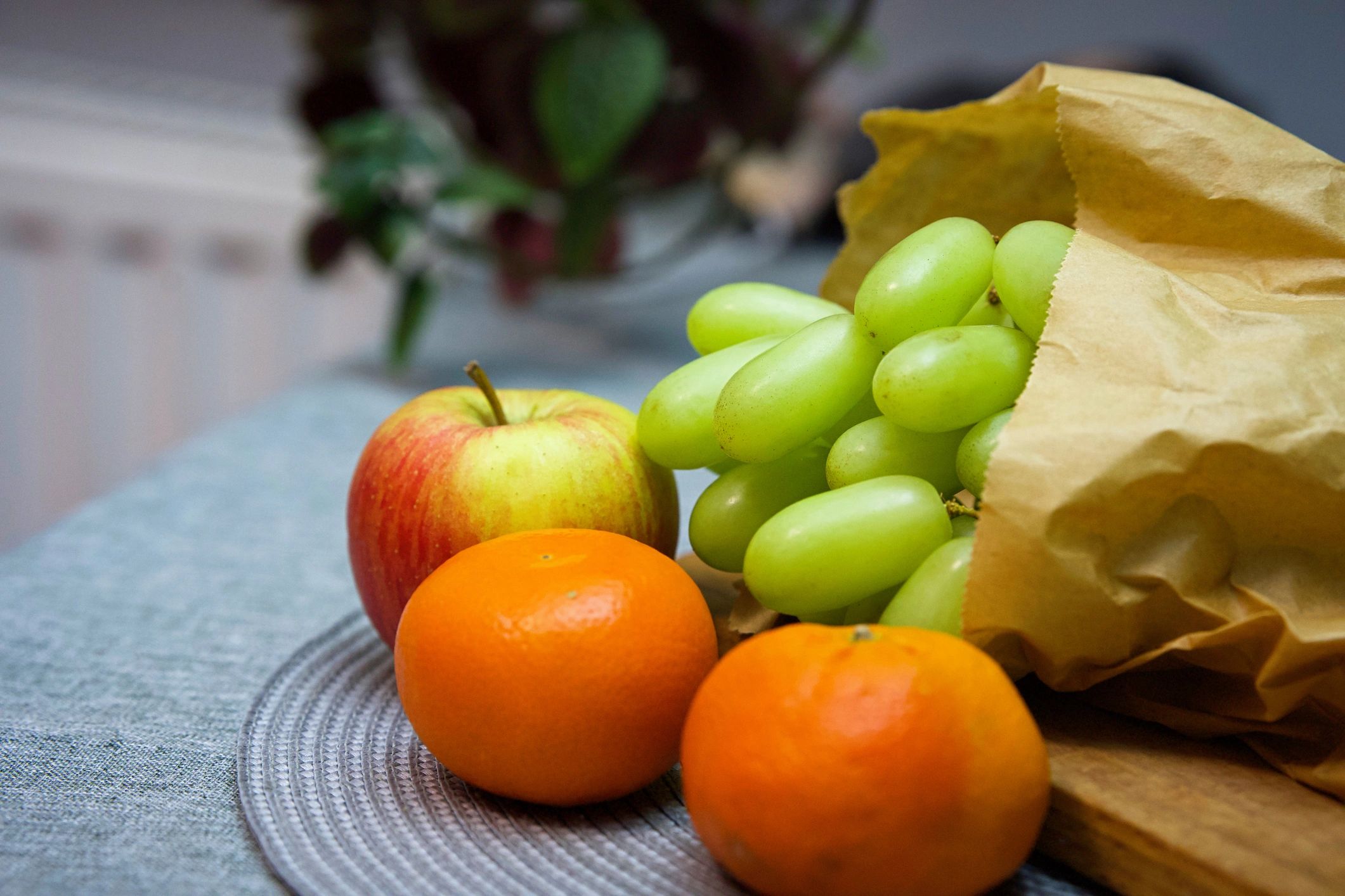 Assortment of fresh organic fruits including apples and citrus